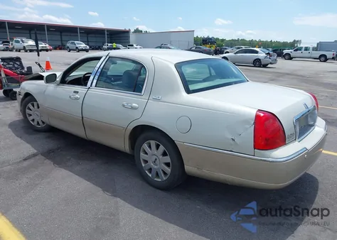 2005 Lincoln Town Car Signature Limited из США, поврежденный, VIN 1LNHM82W65Y649412